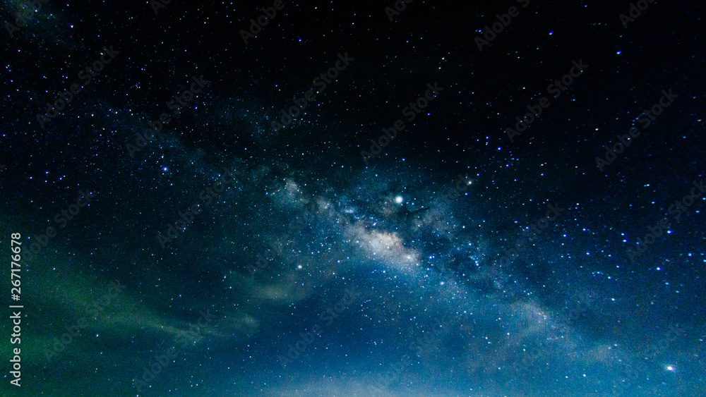 Milky way galaxy with stars and space in the universe background at thailand - obrazy, fototapety, plakaty 