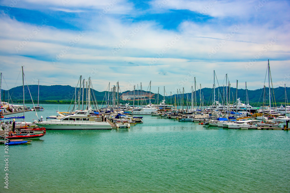 Marina with docked yachts and moored boats in calm blue water in pattaya, Bangkok , Feb 2018