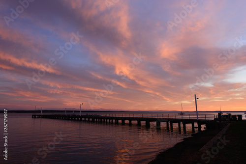 Corinella pier at sunrise viewed from the side © Michael Garner