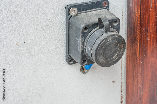 How to remove the electrical outlet on the facade of the house and fix it on the wall
