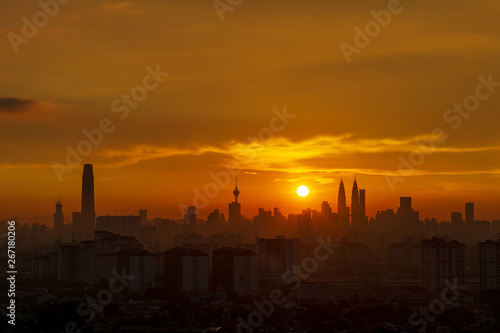 Majestic sunset over downtown Kuala Lumpur  a capital of Malaysia. Its modern skyline is dominated by the 451m-tall Petronas Twin Towers.