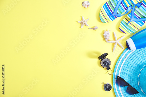Flat lay yellow summer travel concept background