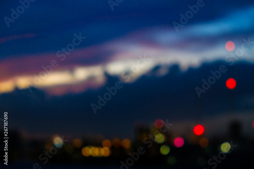 Blurred colorful sunset sky cloud with city building