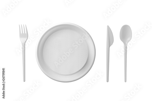 Plastic plate, spoon, fork and knife isolated on white background.
