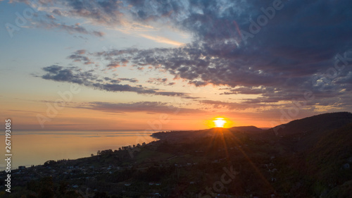 Aerial photography. Evening view of the sea and shore. Sunset over the water. Clouds in the sky. © Ivan_vislov_nadsochi