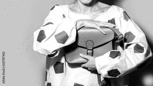 Fashion woman with handbag, black and white