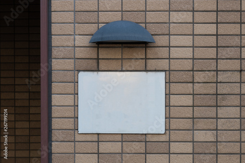 Large blank billboard on a street wall, banners with room to add your own text