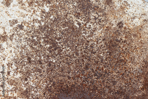 Rusty and painted textured metal background © denizbayram