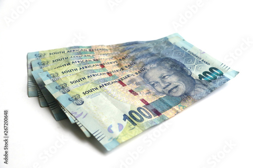 South African rand notes stacked piled up