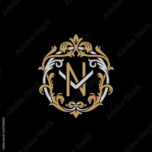 Fototapeta Naklejka Na Ścianę i Meble -  Initial letter V and N, VN, NV, decorative ornament emblem badge, overlapping monogram logo, elegant luxury silver gold color on black background