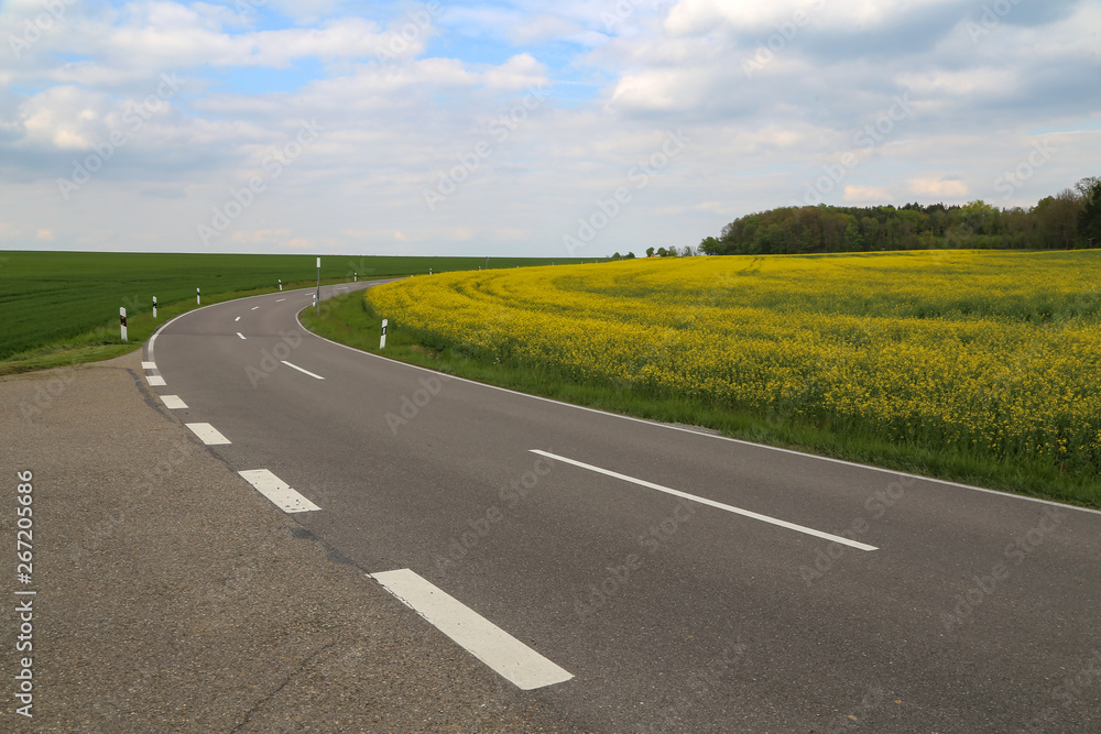 A steep turn among the fields and meadows A steep turn among the fields and meadows