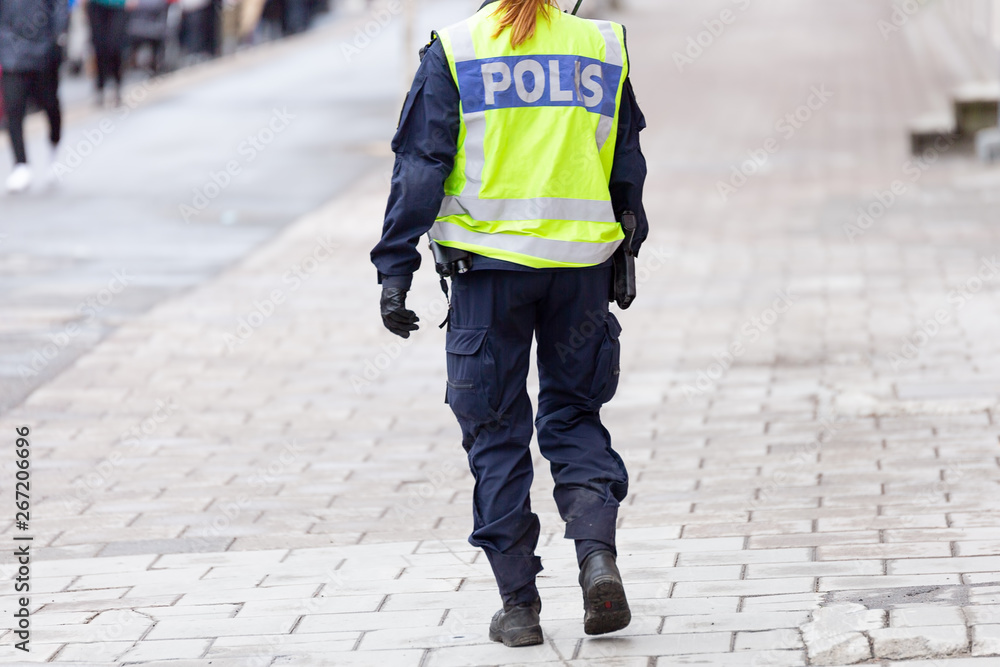 Female Police Officer with reflective vest