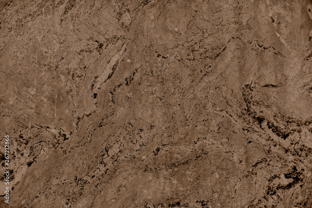 Close up of abstract brown granite stone texture