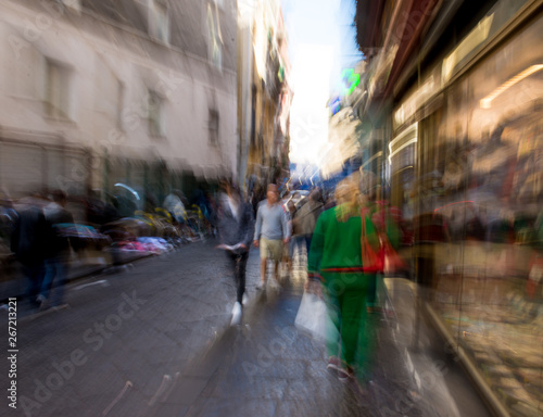 Busy city people going along the street. Intentional motion blur © vbaleha