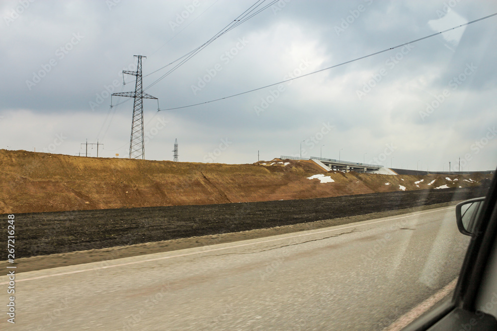 Mound along the freeway.