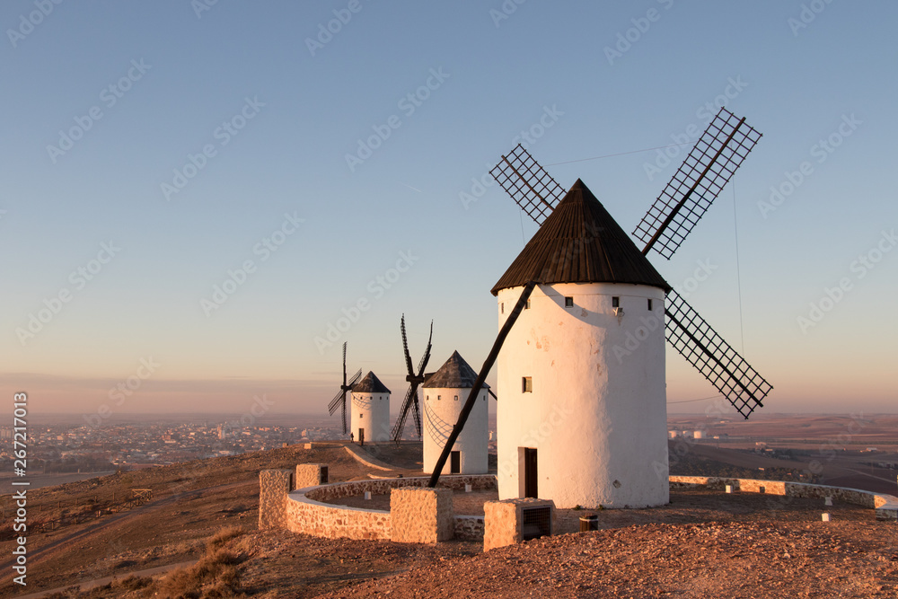 Three old windmills in Alcazar de San Juan, Casilla la Mancha. Don Quixote route. Spain