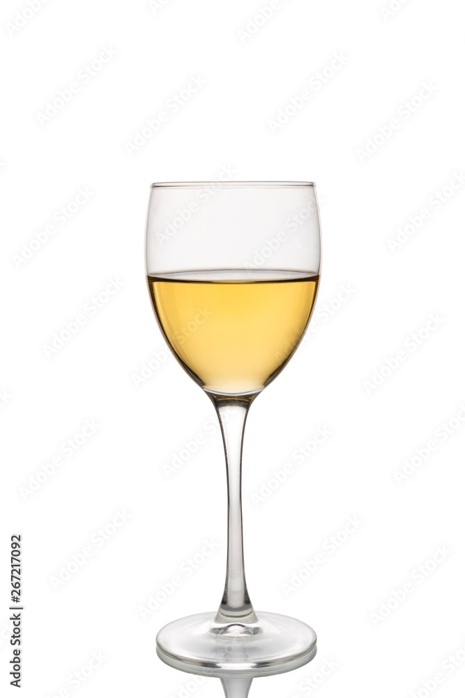 Wine glass with white wine half full.