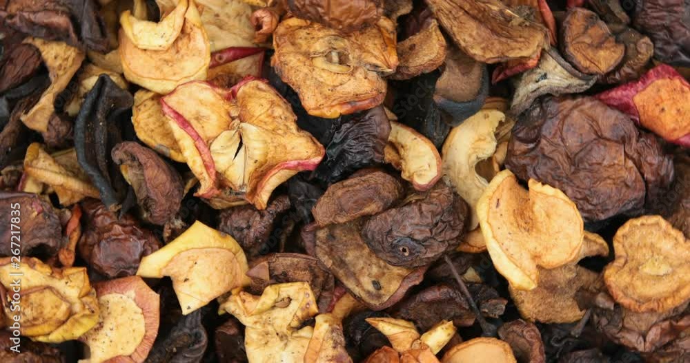 Many dried fruit apples are scattered as a background Many dried fruit apples are scattered as a background
