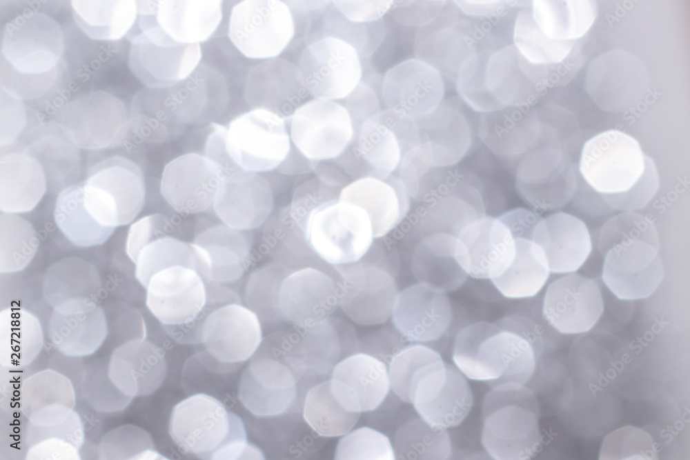 Silver glitter festive background with bokeh lights. Celebration concept for Holidays and anniversary. Silver glitter festive background with bokeh lights. Celebration concept for Holidays and anniversary.