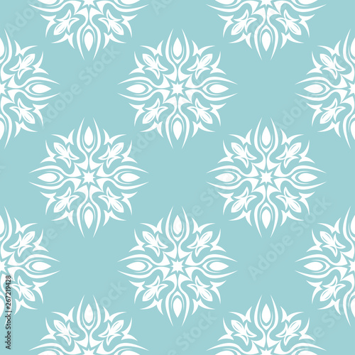 Floral seamless background. White pattern on blue backdrop