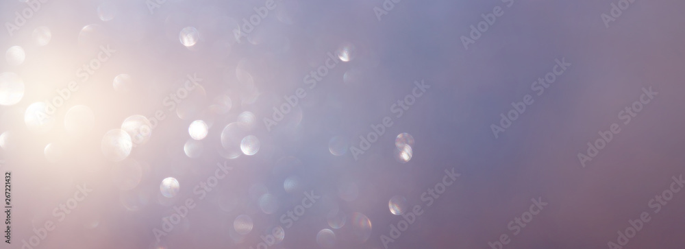 abstract glitter lights background. silver red, purple and gold. de-focused. banner