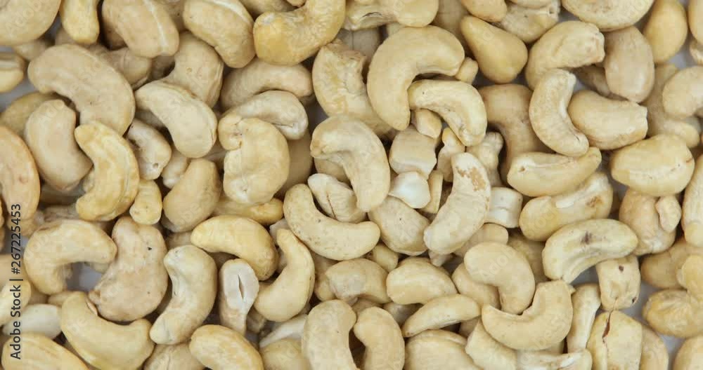 Food background. Cashew nuts rotating Food background. Cashew nuts rotating