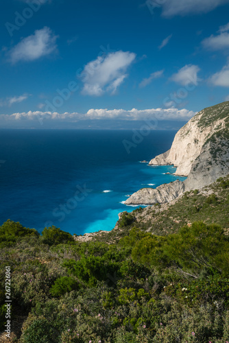 Cliffs above clear turquoise waters of Shipwreck Cove