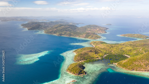 aerial seascape Lagoons with blue  azure water in middle of small islands. Palawan  Philippines. tropical islands with blue lagoons  coral reef. Islands of the Malayan archipelago with turquoise