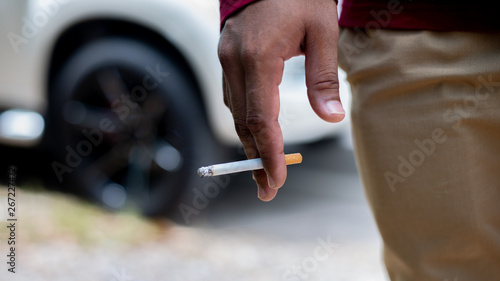 hand with a cigarette