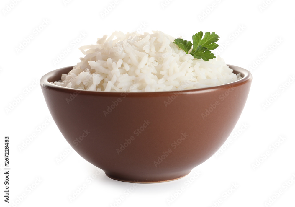 Bowl of tasty cooked rice with parsley on white background Bowl of tasty cooked rice with parsley on white background