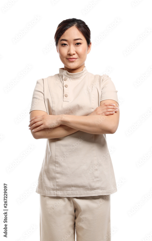 Professional masseuse in spa uniform on white background Professional masseuse in spa uniform on white background
