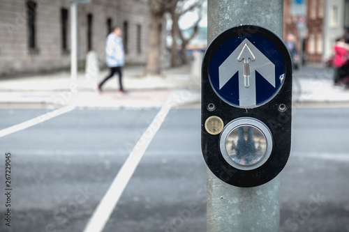 Photography button to activate pedestrian crossing on the road in Dublin