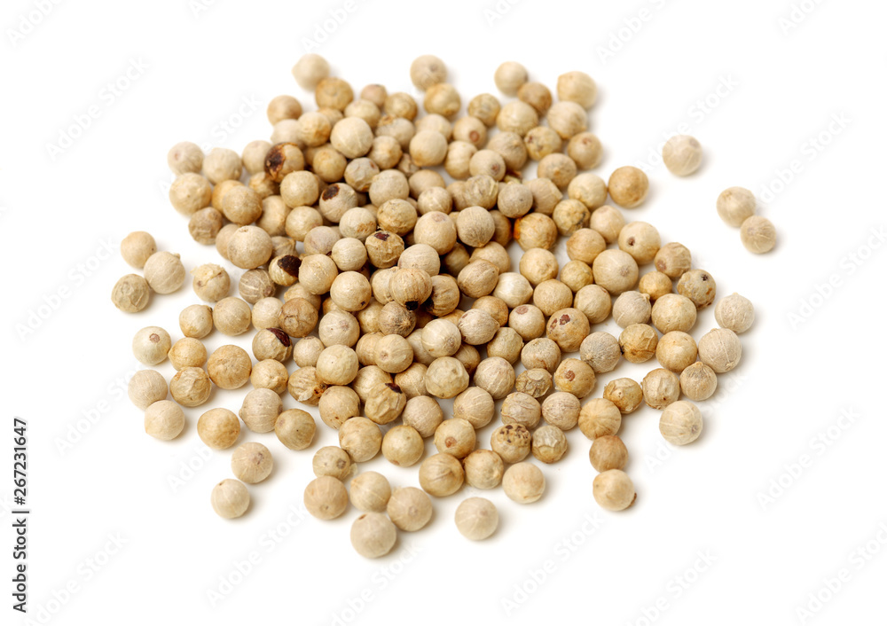 White peppercorns on white background White peppercorns on white background