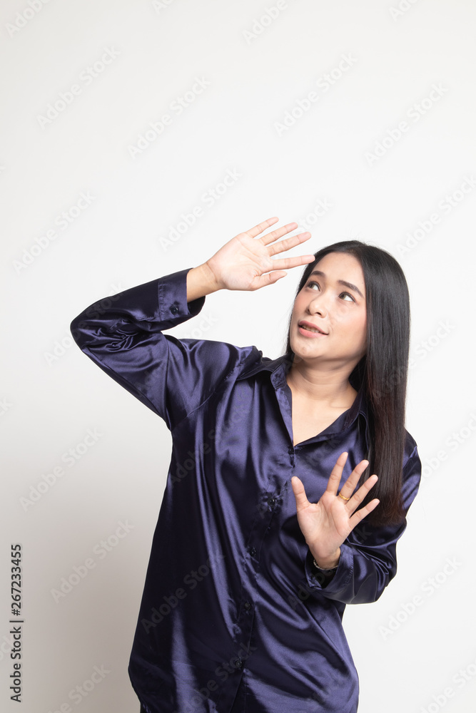 Excited young Asian woman look up. Excited young Asian woman look up.
