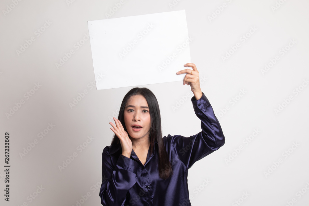 Young Asian woman surprise with white blank sign. Young Asian woman surprise with white blank sign.