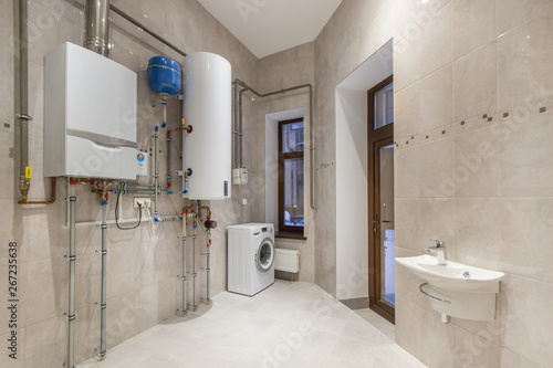 Foto Boiler room with a heating system