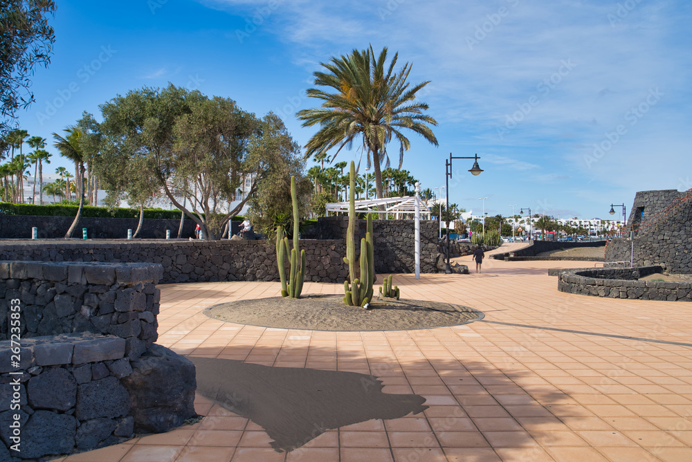Promenade of Playa grande in Puerto del Carmen, Lanztarote, Spain Promenade of Playa grande in Puerto del Carmen, Lanztarote, Spain