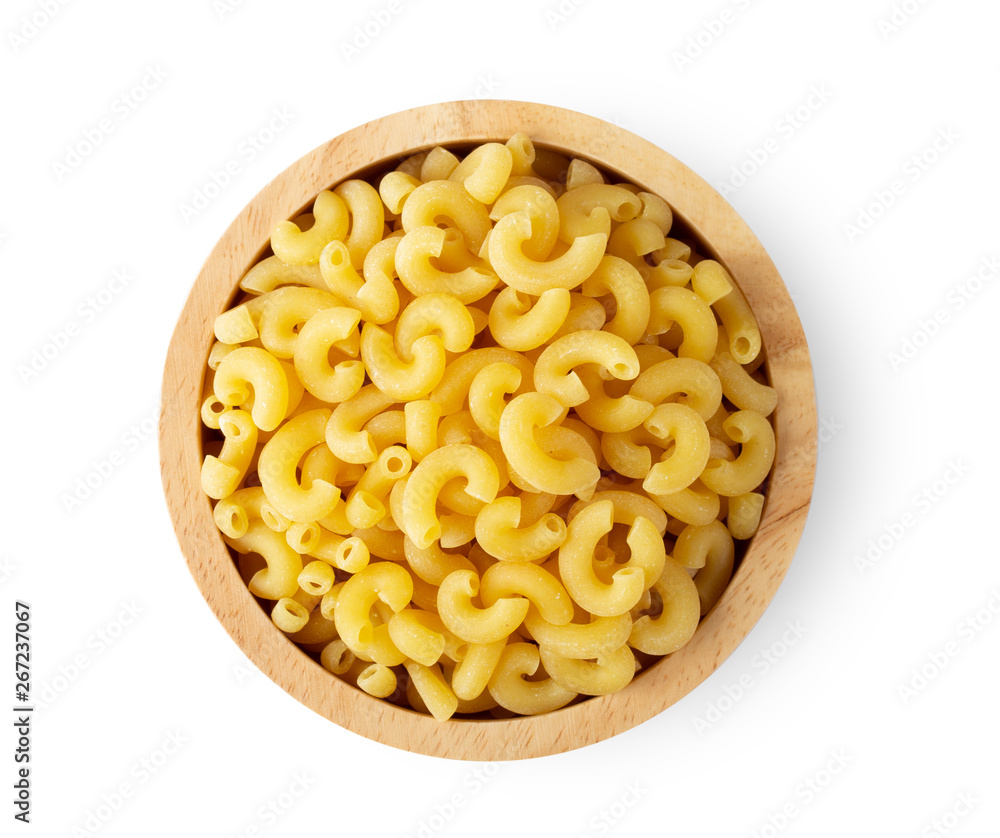 macaroni pasta close up in wood bowl isolated on white background. top view macaroni pasta close up in wood bowl isolated on white background. top view