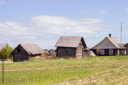 Complex of old wooden houses in a small village in Lithuania