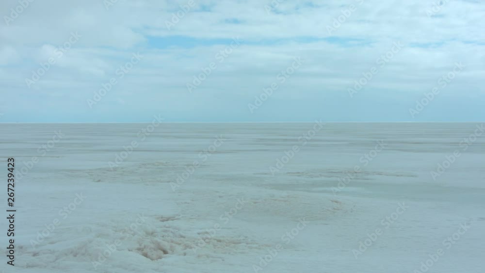 Pan right on endless frozen field in the Arctic. Panning right on an endless frozen icy field in the Arctic. A barren icy wasteland, with no way home, doom all that come here to die a frozen death. Pan right on endless frozen field in the Arctic. Panning right on an endless frozen icy field in the Arctic. A barren icy wasteland, with no way home, doom all that come here to die a frozen death.