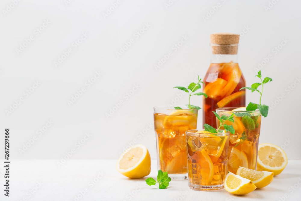 Iced tea with lemon slices, mint and ice Iced tea with lemon slices, mint and ice