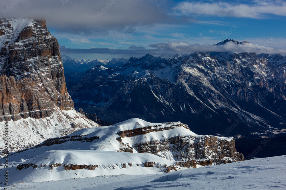 Stunning Dolomite Mountains in Italy on a perfect, sunny Winter Day with blue Sky
