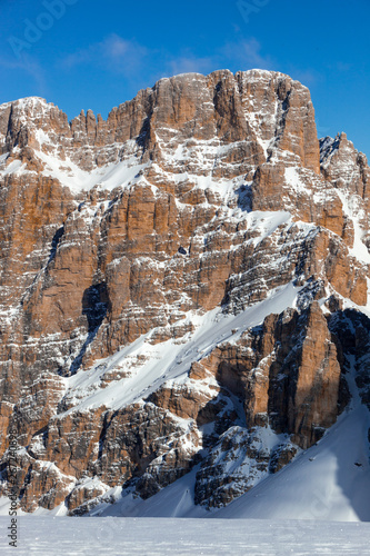 Stunning Dolomite Mountains in Italy on a perfect, sunny Winter Day with blue Sky