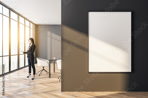 Businessman walking in modern meeting room