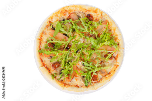 Pizza with arugula, dried tomatoes and mushrooms whole round, cut into pieces, on a white isolated background, view from above