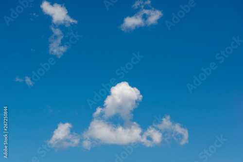 Wonderful blue sky with white clouds. Abstraction.