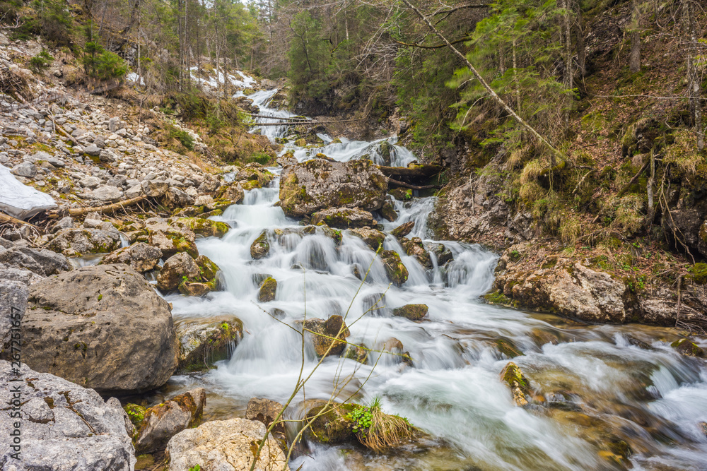 Naklejka premium Long exposure of a waterfall in the mountains.