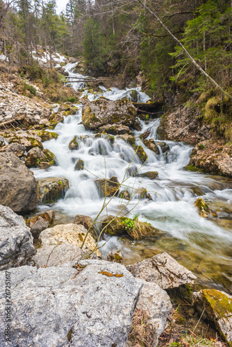 Long exposure of a waterfall in the mountains.