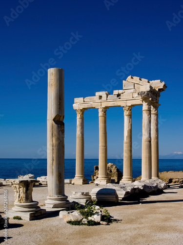 The remains of the temple of Apollo at Side on the southern coast of Turkey. Showing the remains with the deep blue sky of the Mediterranean.  