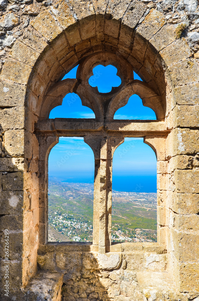 Amazing window view from the St. Hilarion Castle in Northern Cyprus. The popular view point offers a beautiful view over Cypriot Kyrenia region and Mediterranean